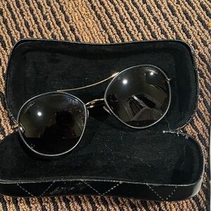 CHANEL Black and Gold Round Sunglasses
